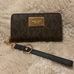 VGUC. Michael Kors, brown and tan logo wallet/wristlet.